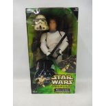 A Star Wars Classic Edition Hasbro Han Solo in a storm trooper disguise 12" figure.