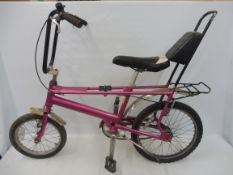 A Raleigh chopper bicycle.