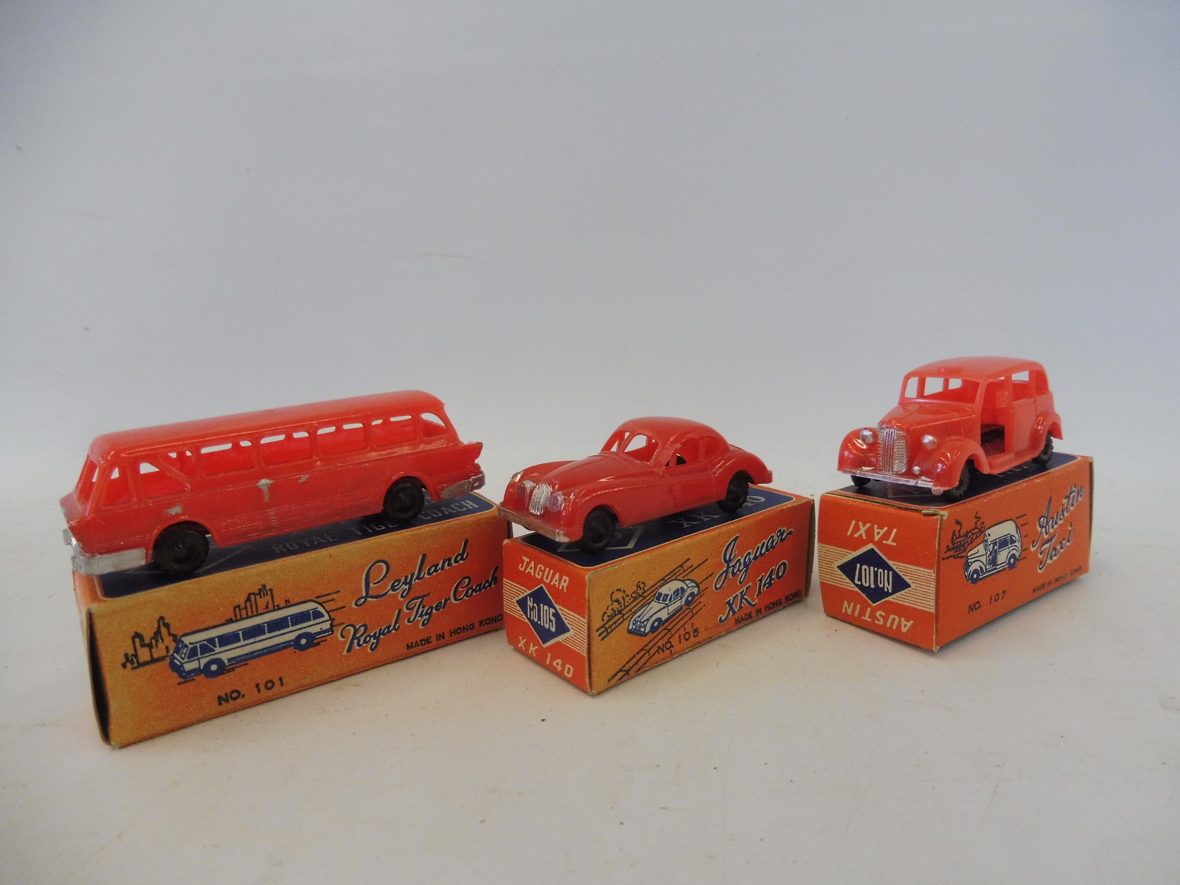 Three unusual Hong Kong made plastic vehicles, in excellent boxes, no.105 Jaguar XK140, no.101 Tiger