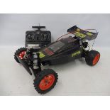 A Tamiya Madcap 58082 1/10th scale electric remote controlled buggy circa 1989, a very good clean