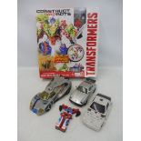 A small quantity of Transformers, some original examples, one more modern boxed.