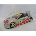 A Peugeot 206 Rally Monte Carlo Pro remote controlled car on a rare Reely/Verbrenner P190 German 4WD