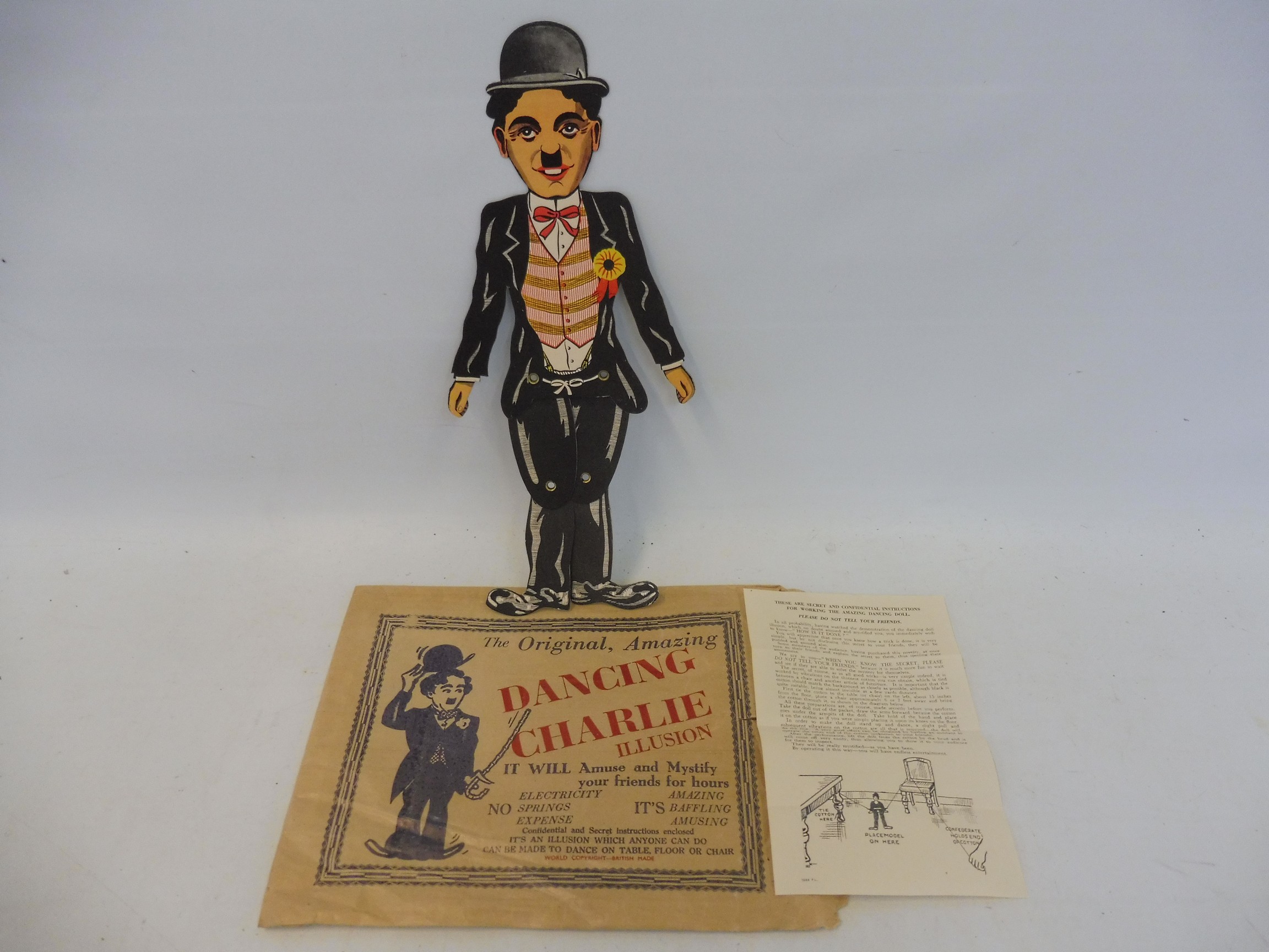 A rare survival dancing Charlie Chaplain, circa 1930s, in the original bag, excellent condition.