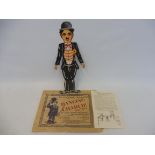 A rare survival dancing Charlie Chaplain, circa 1930s, in the original bag, excellent condition.