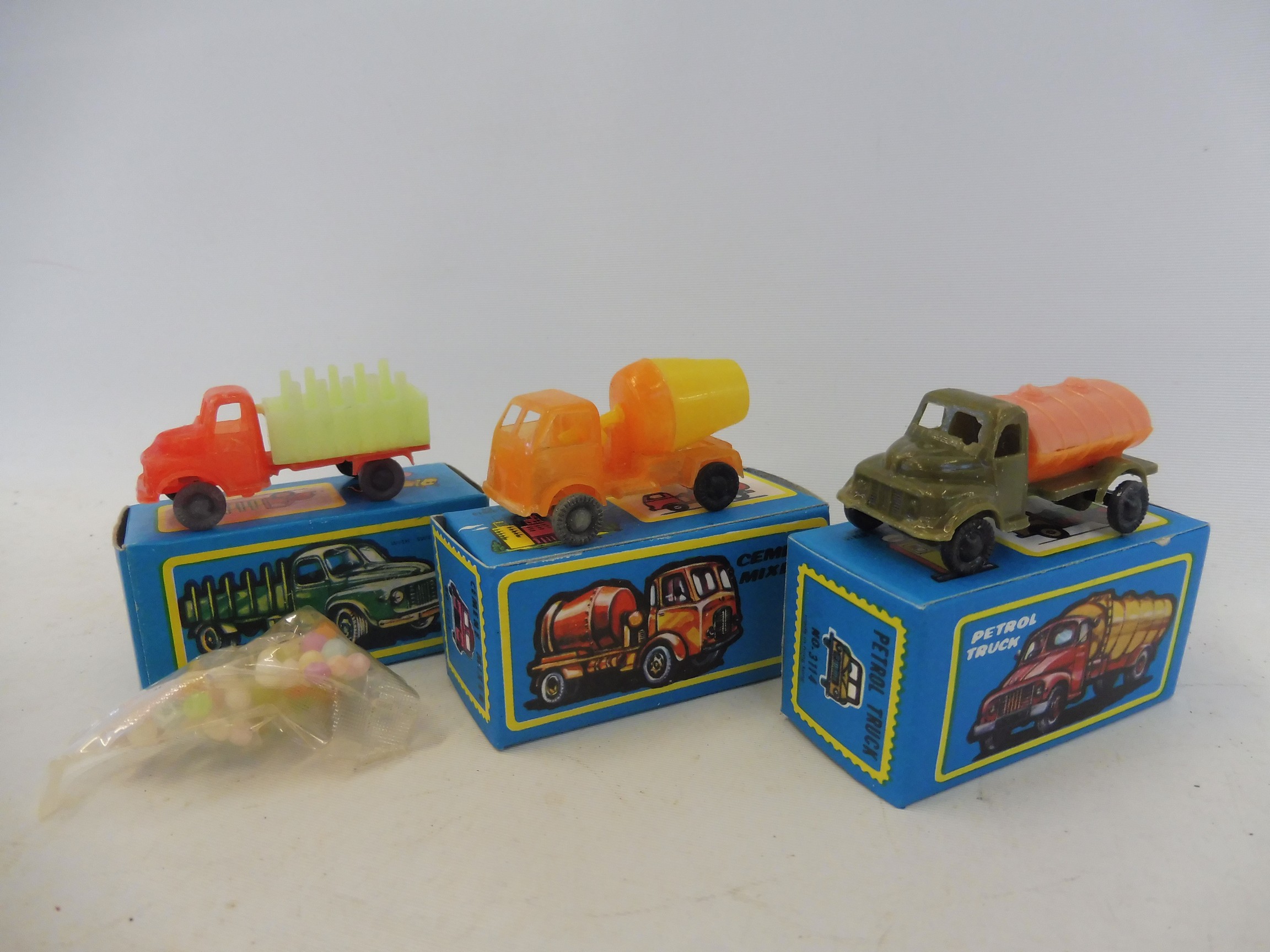 Rosor Novelties - three boxed models, livestock truck, petrol truck and a cement mixer.