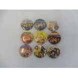 A small collection of original rock badges to include Hawkwind, Motley Crew etc.