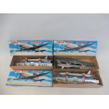 Three Japanese tinplate twin-prop planes in excellent condition.