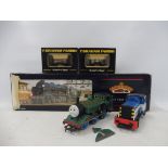 A boxed Bachmann Lord St Vincent Southern Green locomotive plus two boxed Graham Farrish wagons