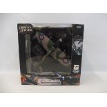 A 1:32 scale Forces of Valour model, Spitfire Mk.IX 1945.