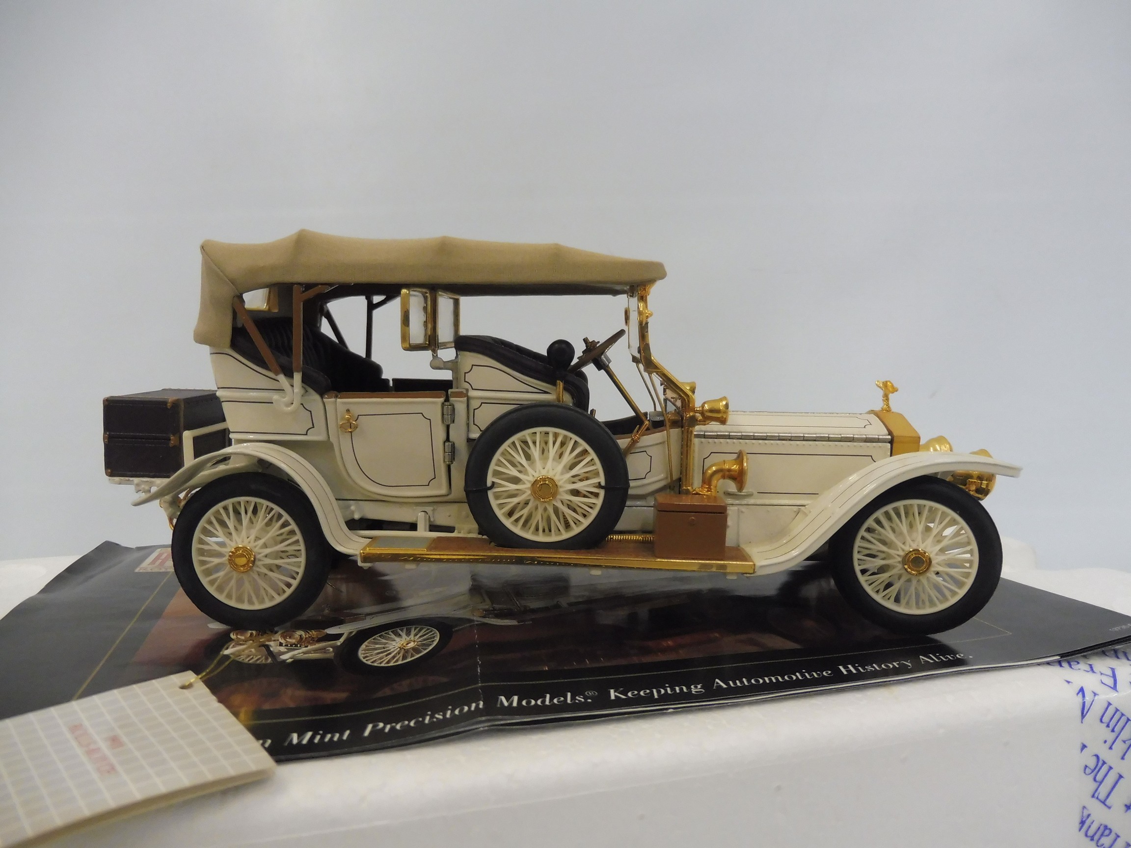 A cased Franklin Mint model of a 1911 Rolls-Royce.