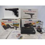 A Sega Master System II Plus special pack, with light phaser and Shinobi Sega game and