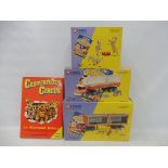 Three boxed Corgi Classics die-cast models from the Chipperfields Circus range, plus a single volume