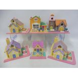 Seven vintage Polly Pocket house playsets marked Bluebird Swindon England.