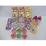 12 vintage Polly Pocket playsets marked Bluebird Swindon England.