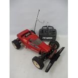 A Tamiya Super Sabre 58066 1/10th scale electric remote controlled buggy on a Boomerang chassis,