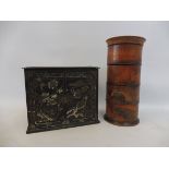 A treen four section spice pot and a toleware tea caddy.