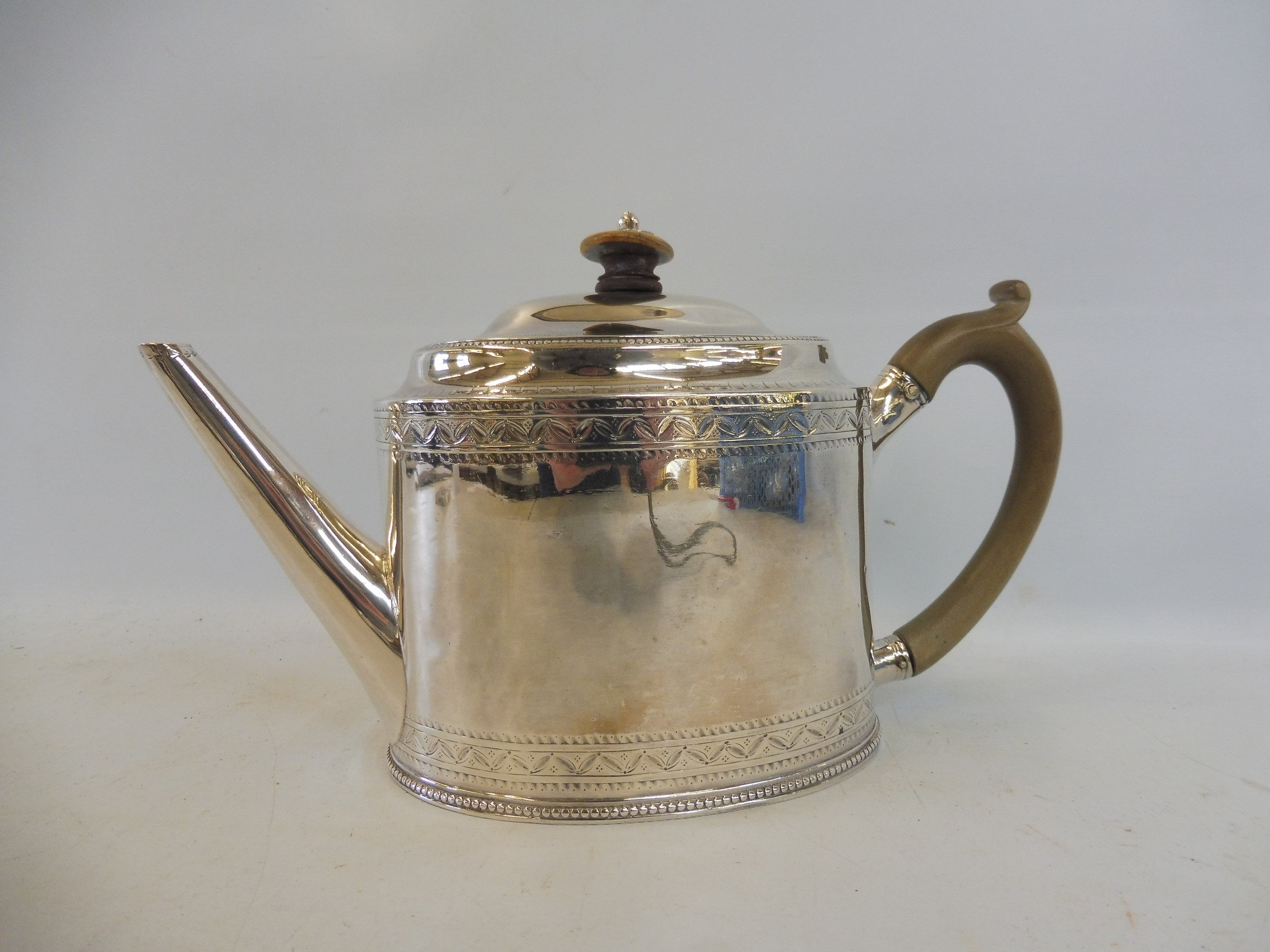 A Georgian silver teapot of oval form, with horn finial and handle, by Hester Bateman, London 1783. - Image 2 of 5