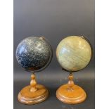 A Philip's Educational terrestrial globe and a matching celestial globe, each 10" h.