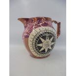 A 19th Century Sunderland lustre jug decorated with a nautical compass to one side and a poem