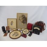 A red leather box for photographs containing early religious books, various early prints, two