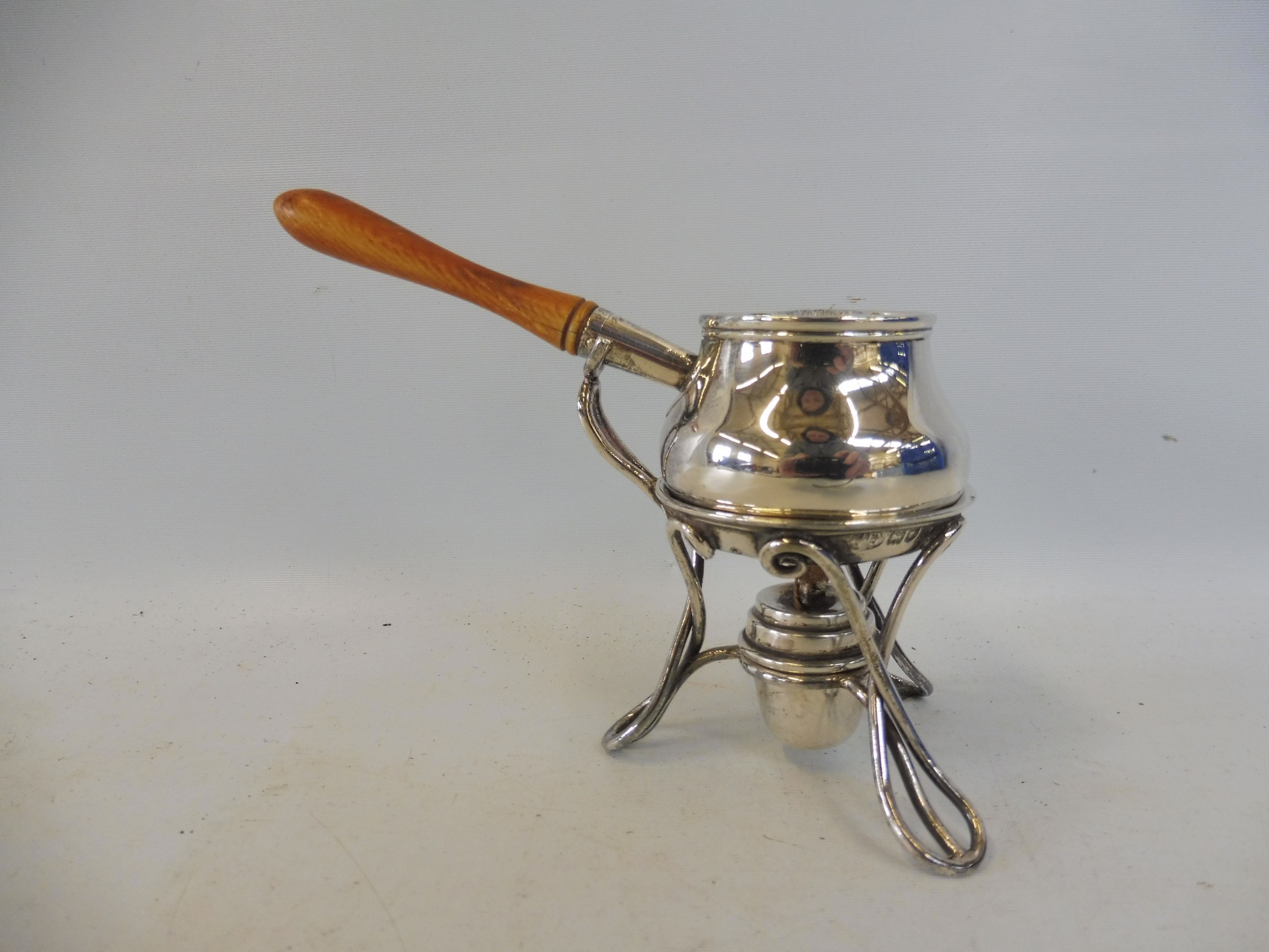 An Art Nouveau style silver miniature brandy saucepan with pouring spout, raised on a spirit - Image 3 of 5