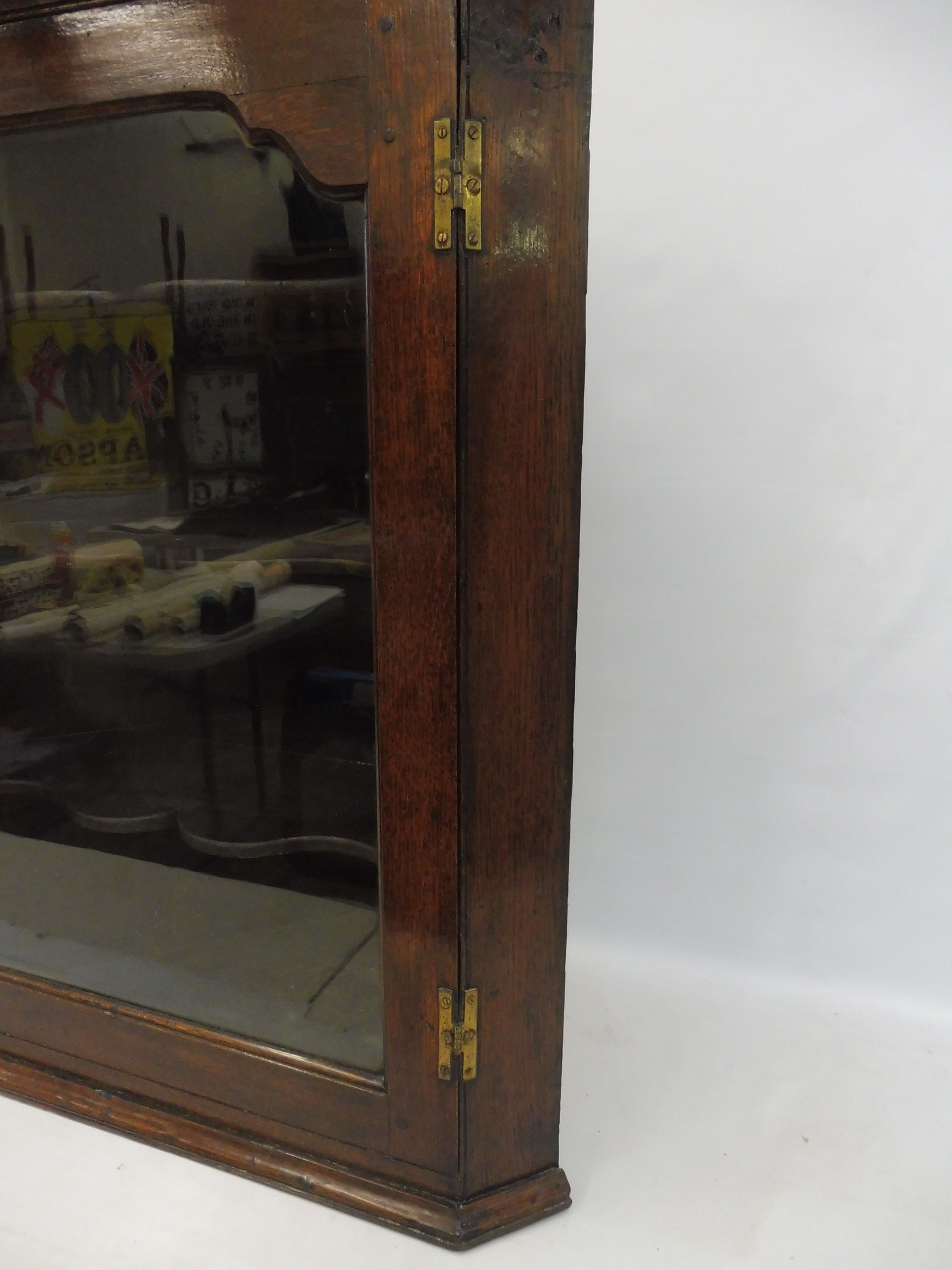 A Georgian oak wall hanging corner cabinet with glazed door enclosing shaped shelves, 29 1/2" wide x - Image 4 of 7