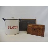An enamel 'Flour' bin, a Victorian tunbridge ware dome topped tea caddy and a slate school board.