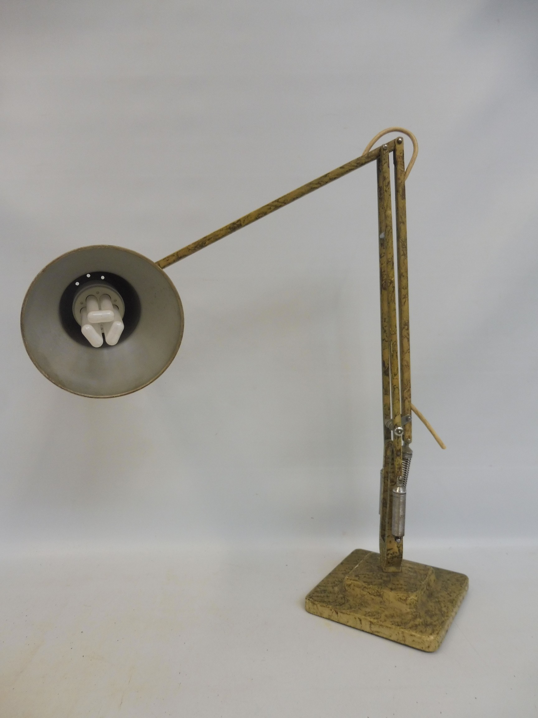 A 1970s angle poise lamp with mottled finish.