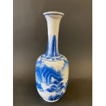 A Chinese blue and white slender vase, marks to base.