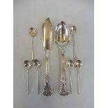 A silver fish knife, London 1871, a silver spoon London 1868 and a set of six silver condiment