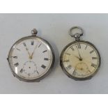 Two silver pocket watches.