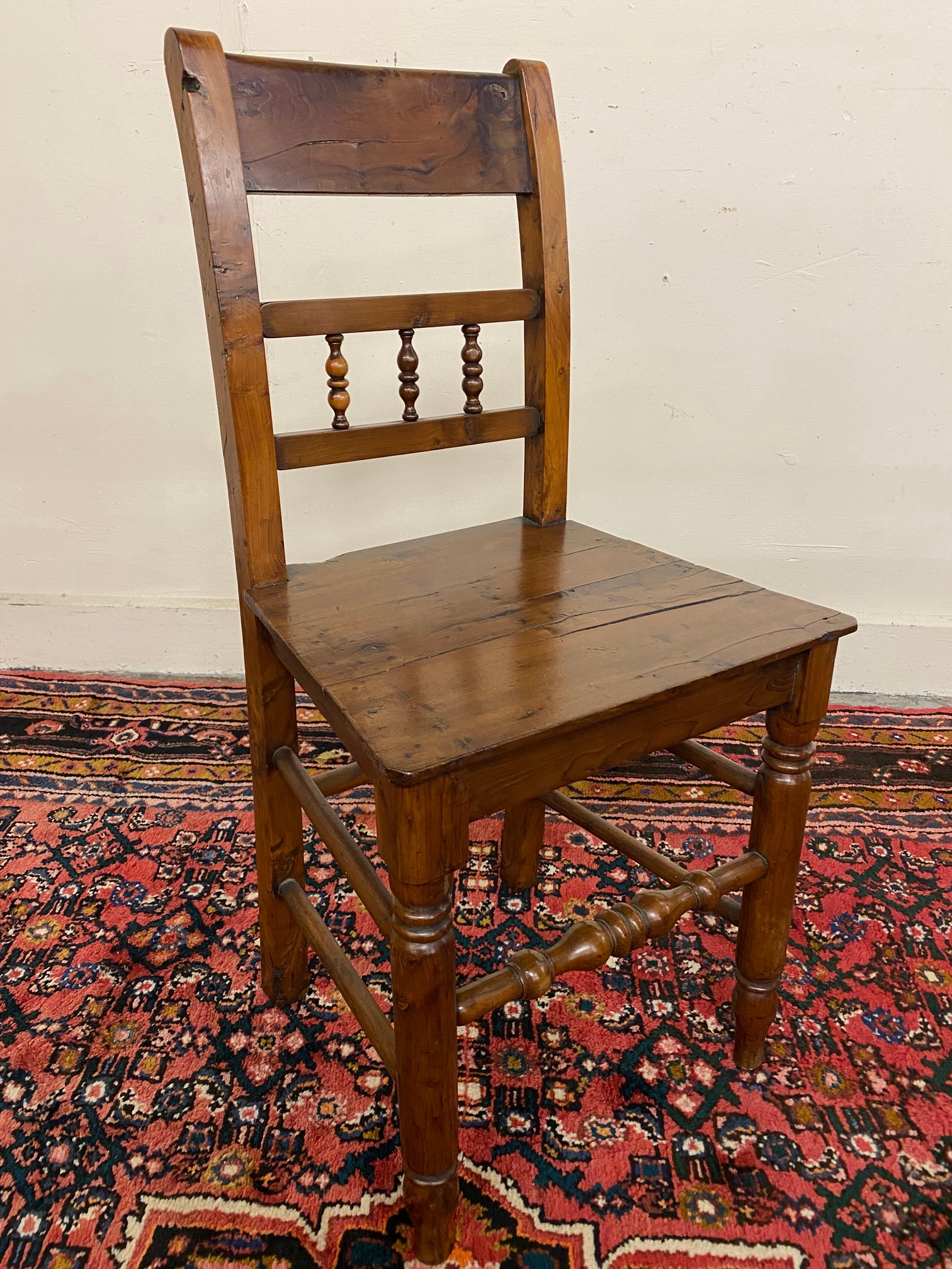 A 19th Century estate made solid yew wood single chair.