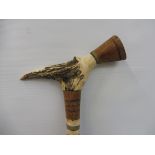 An antler handled walking stick.