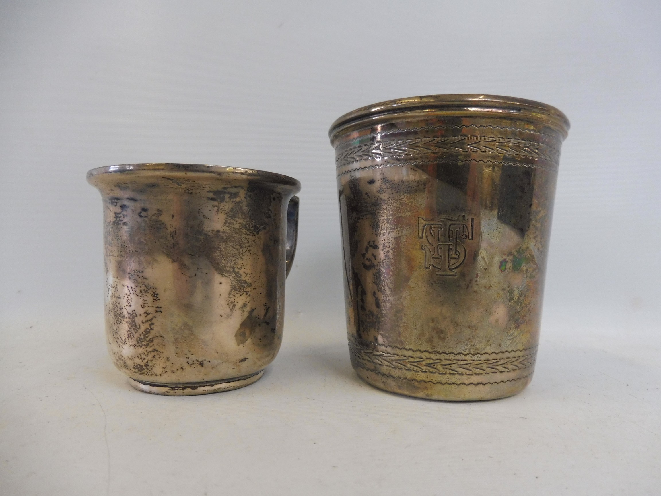 A Victorian silver beaker, London 1864 plus a silver cup, Birmingham hallmark.