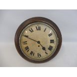 An oak cased dial clock.