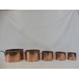 A set of five 19th Century copper and steel handled graduated sauce pans.