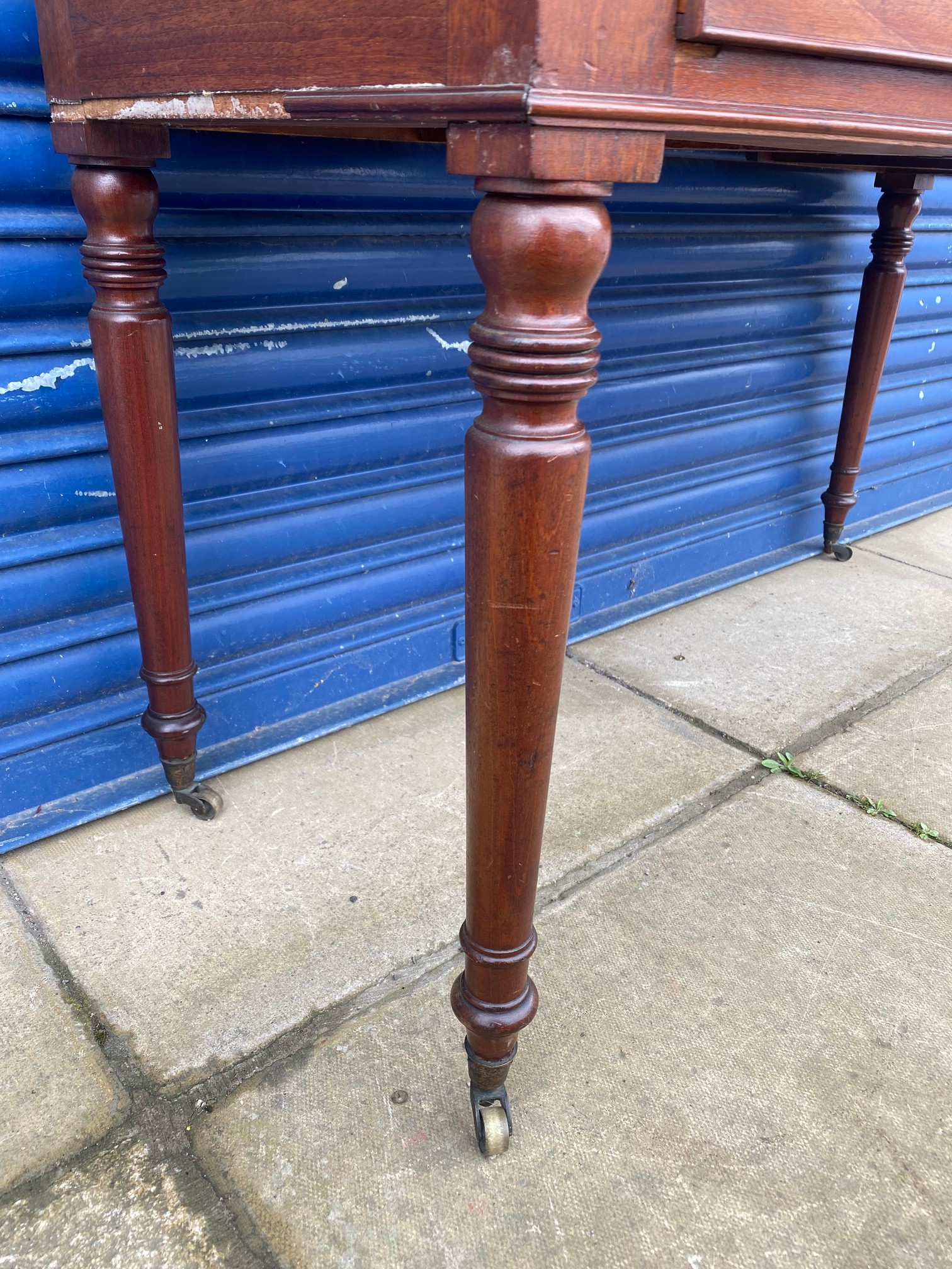 An early 19th Century mahogany bow fronted desk of a single drawer above two smaller drawers, raised - Image 6 of 8