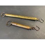 A Salter 0-4lb brass spring balance scale, overall length 7" and one other 0-8lb 10" overall.