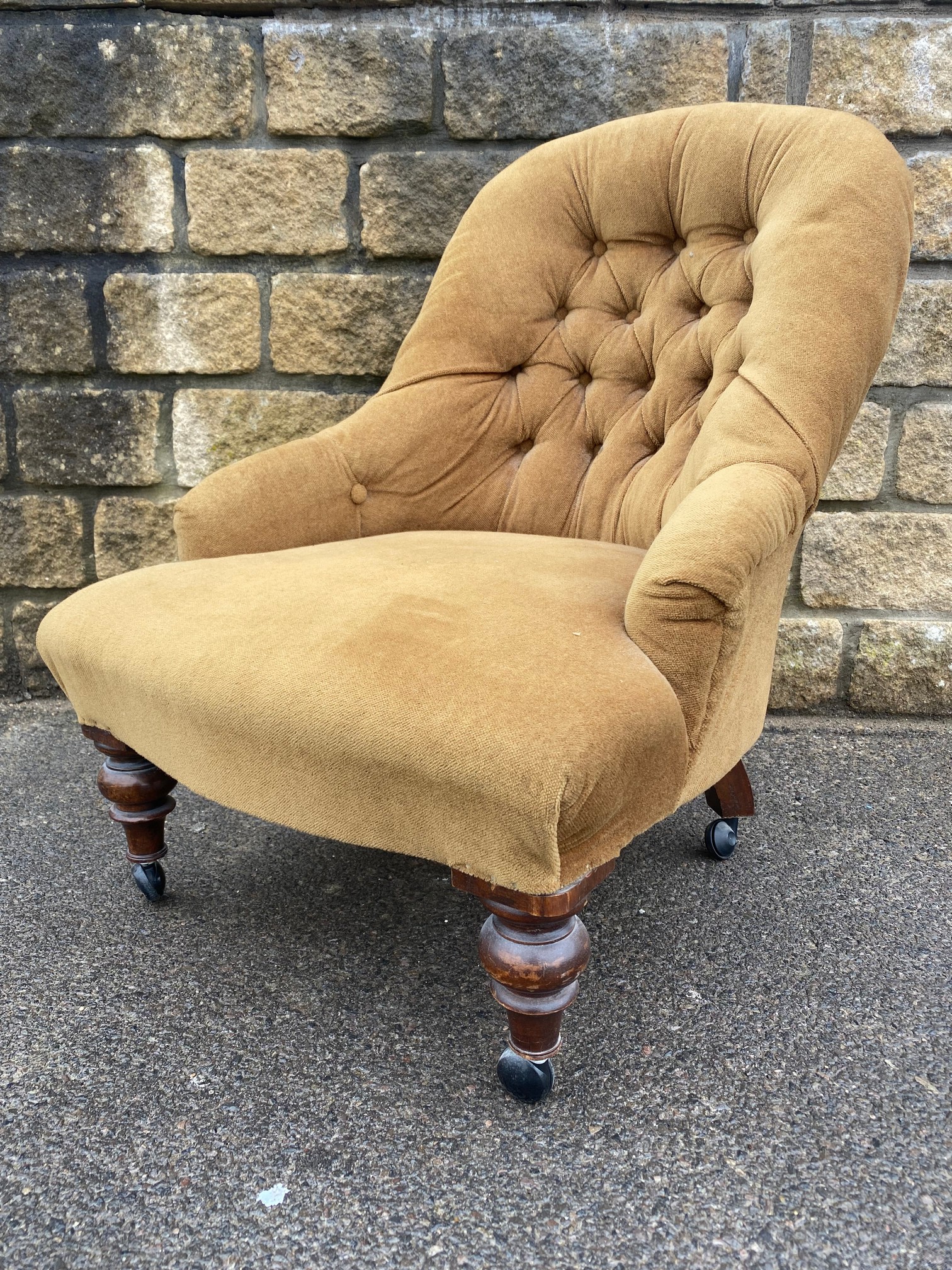 A late Victorian upholstered nursing chair.