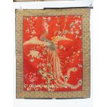 A Chinese embroidered silk wall hanging panel depicting a bird of paradise, 31 3/4 x 38 1/2".