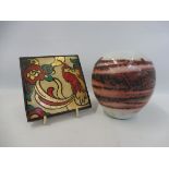 A Red Hill pottery tile of Persian design, marked Wades to reverse, plus a studio pottery vase.