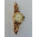 A cased 9ct gold ladies wristwatch, overall weight 21.8g.