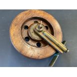 A Pownall's Rag Oilin Patent no. 361767 5" wooden centre pin reel.