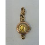 A 9ct gold Rolex ladies wristwatch, with yellow metal strap, overall weight 20.7g.