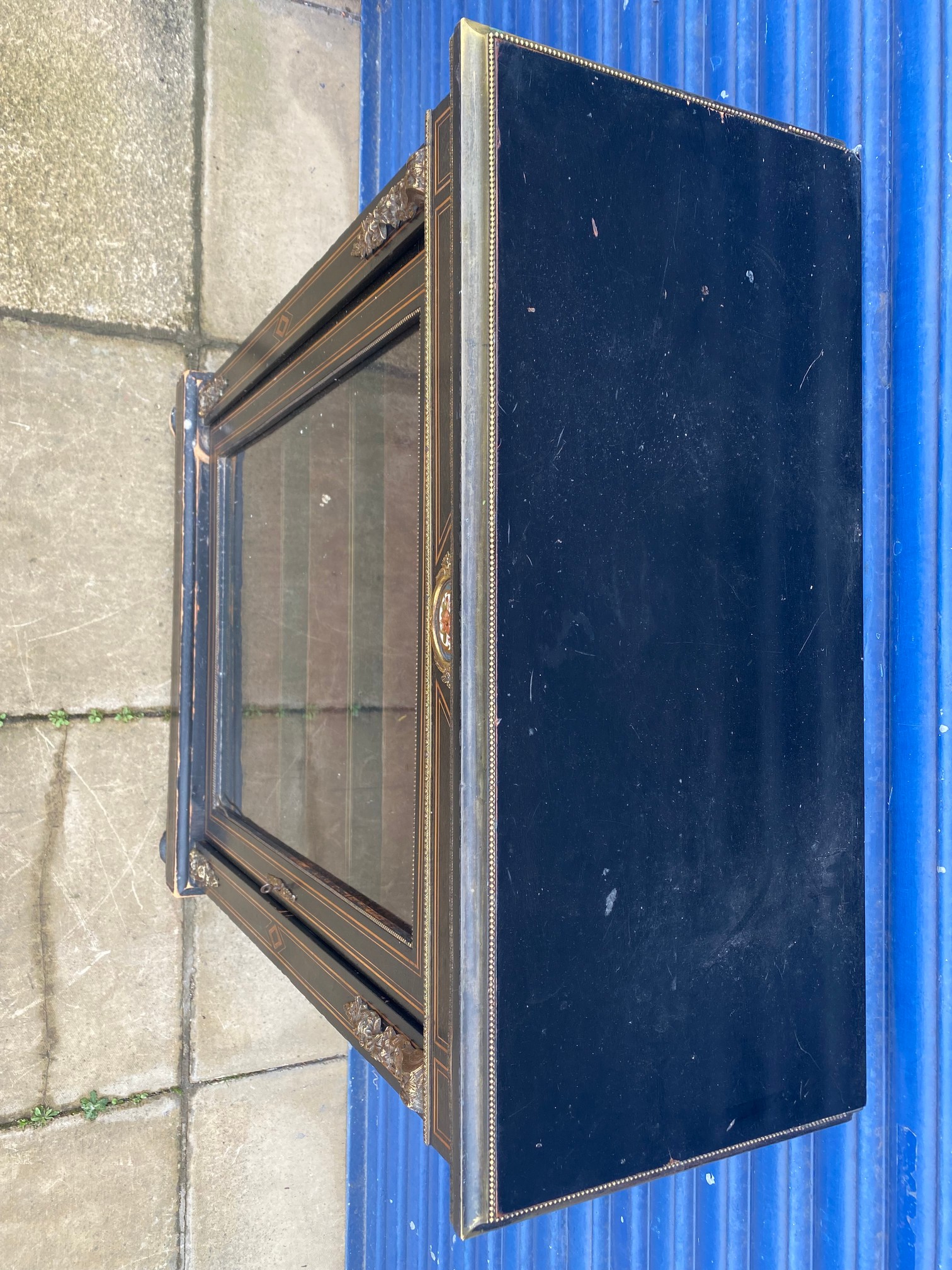 A 19th Century ebonised and brass mounted pier cabinet, with retailer's label to the back for - Image 7 of 9