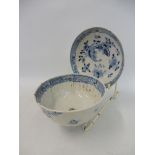 A large Chinese blue and white tea bowl and saucer.