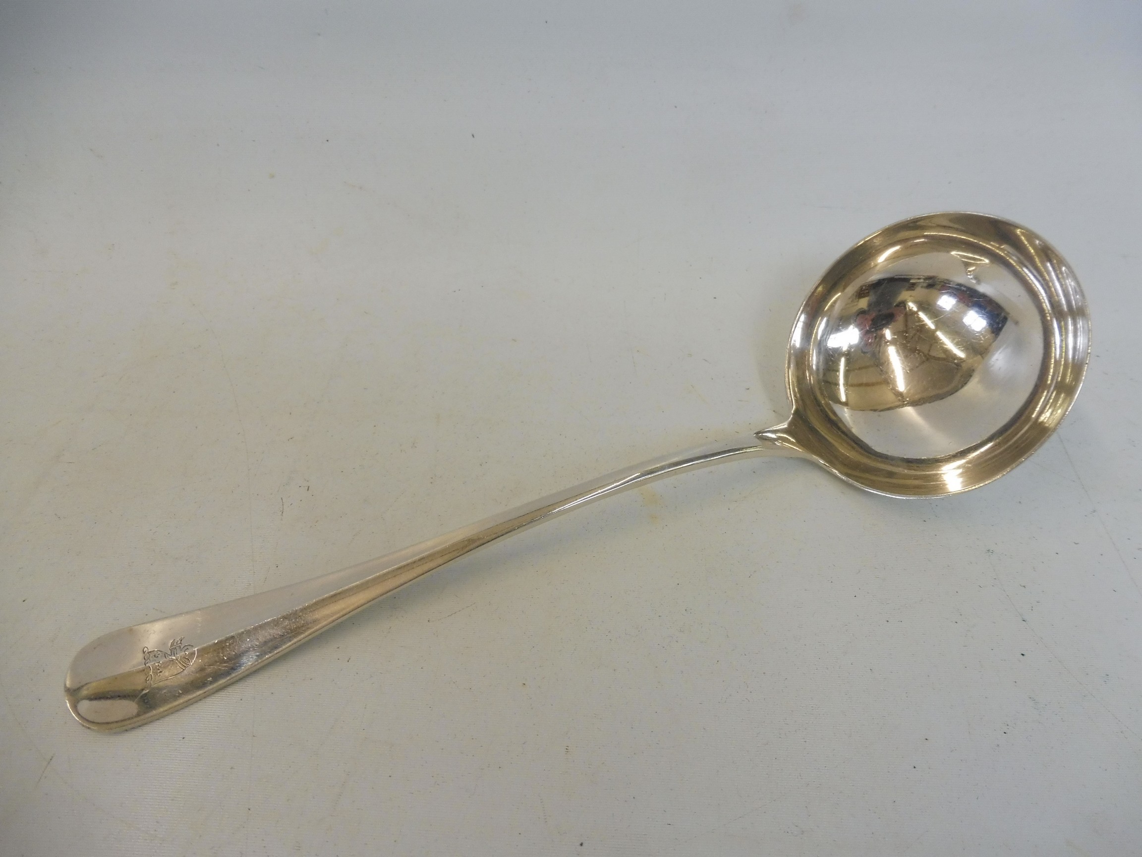 A heavy silver rat tail ladle, Birmingham 1934, possibly Barker Ellis & Co.