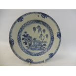 A Chinese blue and white saucer/dish, 19th Century or earlier, 9" diameter.