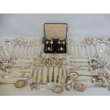 A large quantity of silver plated flatware, and serving spoons etc.