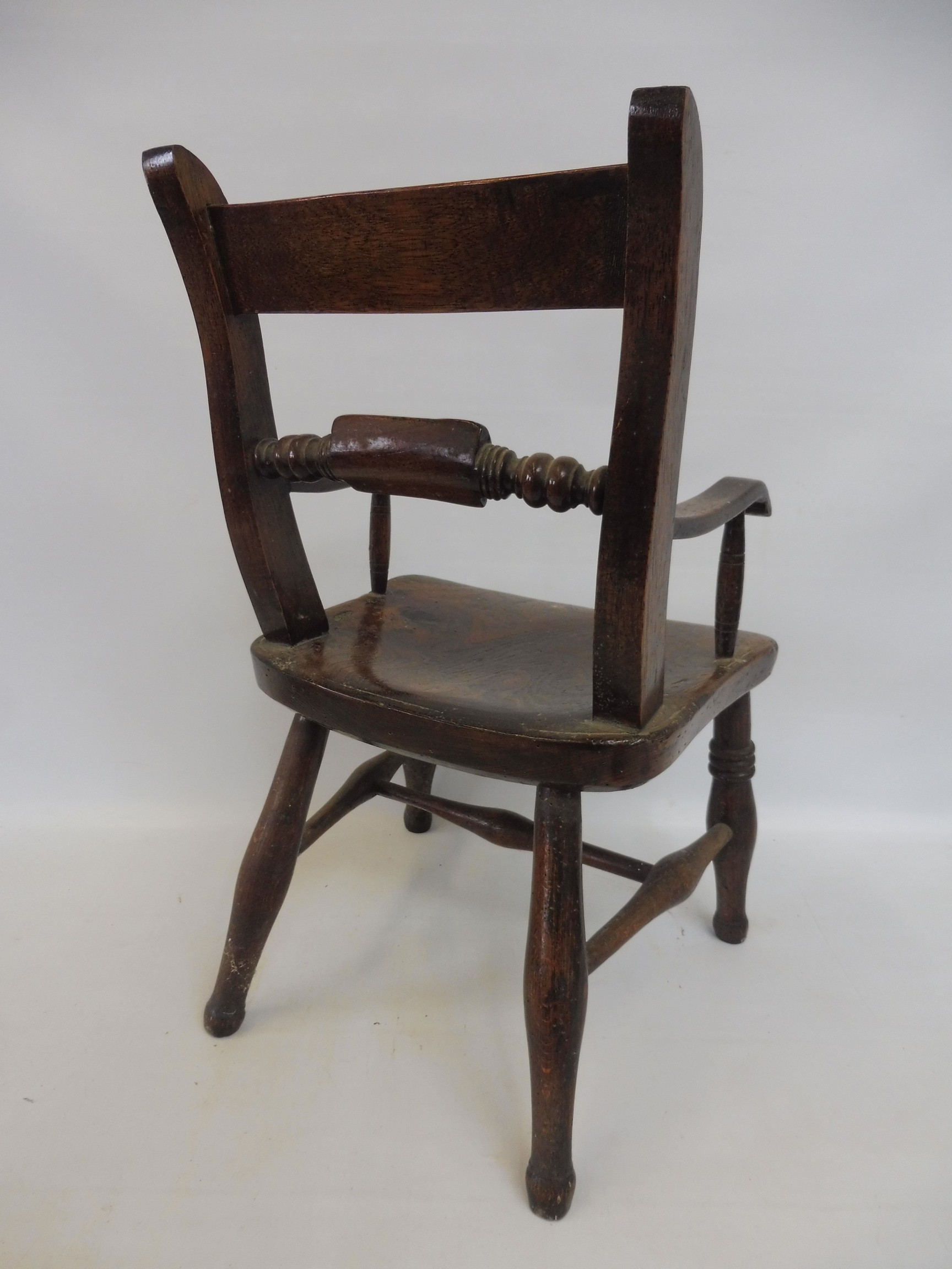 An elm seated child's Oxford style armchair. - Image 3 of 7